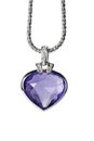 Silver pendant and blue heart shaped gemstone Royalty Free Stock Photo