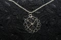 Silver pendant on chain Royalty Free Stock Photo