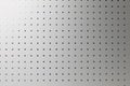 Silver perforated aluminum sheet, background Royalty Free Stock Photo
