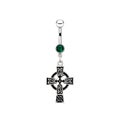 Silver piercing in the shape of celtic cross