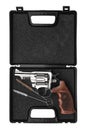 Silver pistol revolver in a plastic case isolate on a white background