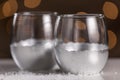 Silver Plated Stemless Wine Glasses On Snowy Abstract Christmas