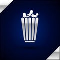 Silver Popcorn in cardboard box icon isolated on dark blue background. Popcorn bucket box. Vector Illustration Royalty Free Stock Photo