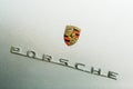 Silver Porsche Spyder Sportscar emblem with copy space