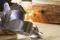 Silver present bow and beautiful lights on the back Royalty Free Stock Photo
