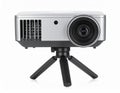 Silver Projector on Small Tripod with Black Legs on White Background Royalty Free Stock Photo