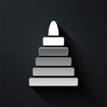 Silver Pyramid toy icon isolated on black background. Long shadow style. Vector