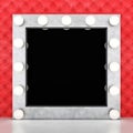 Silver retro makeup mirror on leather background