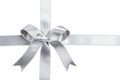 Silver ribbon with bow on white background. Royalty Free Stock Photo