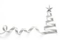 Silver ribbon Christmas tree made of satin bow scroll with star isolated on white background with clipping path for winter xmas Royalty Free Stock Photo