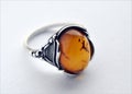 Silver ring and amber Royalty Free Stock Photo