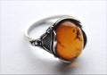 Silver ring and amber Royalty Free Stock Photo