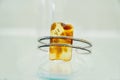 Silver ring with amber on a glass shelf Royalty Free Stock Photo