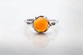 Silver ring with amber stone cabochon Royalty Free Stock Photo