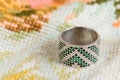 Silver ring with green gemstone