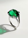 Silver ring with green tourmaline gemstone.