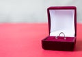 Silver ring heart in red box. st Valentine`s Day proposal gesture present