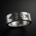 A silver ring with a jagged break in the middle, showcasing a rough texture. Both halv Royalty Free Stock Photo