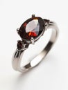 Silver ring with red ruby gemstones. Royalty Free Stock Photo