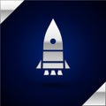 Silver Rocket ship icon isolated on dark blue background. Space travel. Vector Illustration Royalty Free Stock Photo