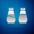 Silver Salt and pepper icon isolated on blue background. Cooking spices. Vector Royalty Free Stock Photo