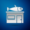 Silver Seafood store icon isolated on blue background. Facade of seafood market. Vector. Royalty Free Stock Photo