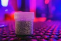 Silver Sequins for the design in a box at the disco show. Glitter in jars. Foil for women service. Sparkling beauty shimmer