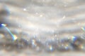 White and silver sequins, highlights sparkling carpet. Close-up, very shallow depth of field . Macro. Royalty Free Stock Photo