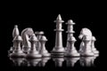 Silver set chess pieces on a black Royalty Free Stock Photo