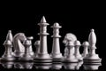 Silver set chess pieces on a black Royalty Free Stock Photo