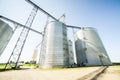 Silver, shiny agricultural silos