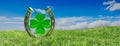 Silver horseshoe green four leaf clover on grass background. Copy space, banner. 3d illustration Royalty Free Stock Photo