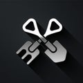 Silver Shovel and rake icon isolated on black background. Tool for horticulture, agriculture, gardening, farming. Ground