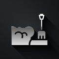 Silver Shovel in snowdrift icon isolated on black background. Long shadow style. Vector