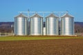 Silver silo in rural landscape Royalty Free Stock Photo