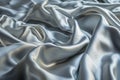 Silver smooth satin or silk texture background. Gray fabric abstract texture. Luxury satin cloth. Silky and wavy folds of silk Royalty Free Stock Photo