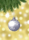 Silver snowflake christmas balls with abstract bokeh background and pine branches Royalty Free Stock Photo