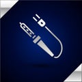 Silver Soldering iron icon isolated on dark blue background. Vector