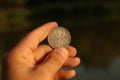 Silver Soviet coin one ruble in hand Royalty Free Stock Photo