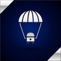 Silver Space capsule returning to earth via parachute icon isolated on dark blue background. Vector Illustration Royalty Free Stock Photo