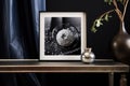 silver sparkling ball in the center of a black frame