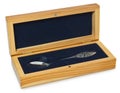 Silver spoon in an elegant wooden box lined with blue velvet. Box open, a teaspoon is engraved clock and date of birth of the chil Royalty Free Stock Photo