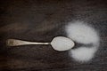 Silver spoon with sugar Royalty Free Stock Photo