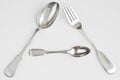 Silver spoons and silver fork Royalty Free Stock Photo