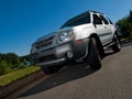 Silver Sports Utility Vehicle low angle