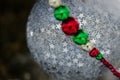 Silver Starred Christmas Ornament Decorating a Snowy Outdoor Tree