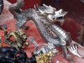 Silver statue of dragon at open air market, Luang Prabang, Laos Royalty Free Stock Photo