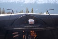 Silver steel kettle on a campfire in modern house patio on a cold winter day Royalty Free Stock Photo