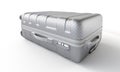 Silver suitcase is laying down on a white surface, ready for a trip Royalty Free Stock Photo