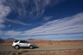Silver SUV driving in Utah. Royalty Free Stock Photo
